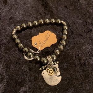 Genuine Hematite Gemstone Bracelet with dangling dove charm